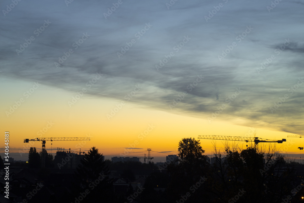 A construction site in Berlin at sunrise with copy space.  Long exposure Photo.