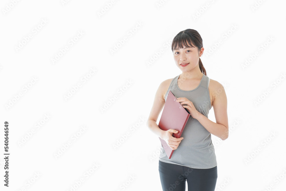 スポーツウェアを着た若い女性 スポーツウェアを着た若い女性