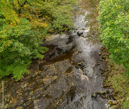 Gilderdale burn on the Cumbria / Northumberland border in early autumn photo