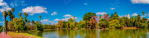 Panoramic view over Palermo district 3rd  February park and garden with beautiful nature, lagoons at sunny day, blue sky and people doing sport and relaxing © neurobite
