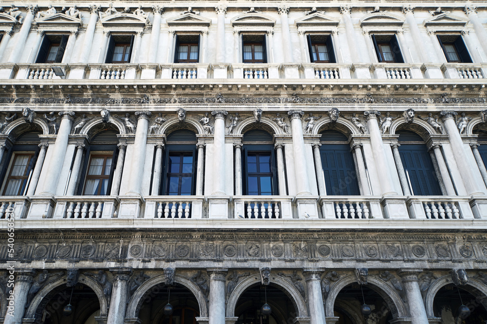 Highly detailed close-up view of the facade of Procuratie Nuove on the St Mark's square in Venice, Italy