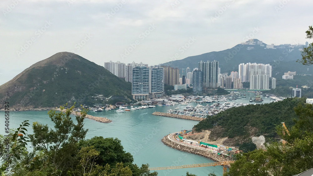 Hong Kong, China, November 2016 - A river with a city in the background