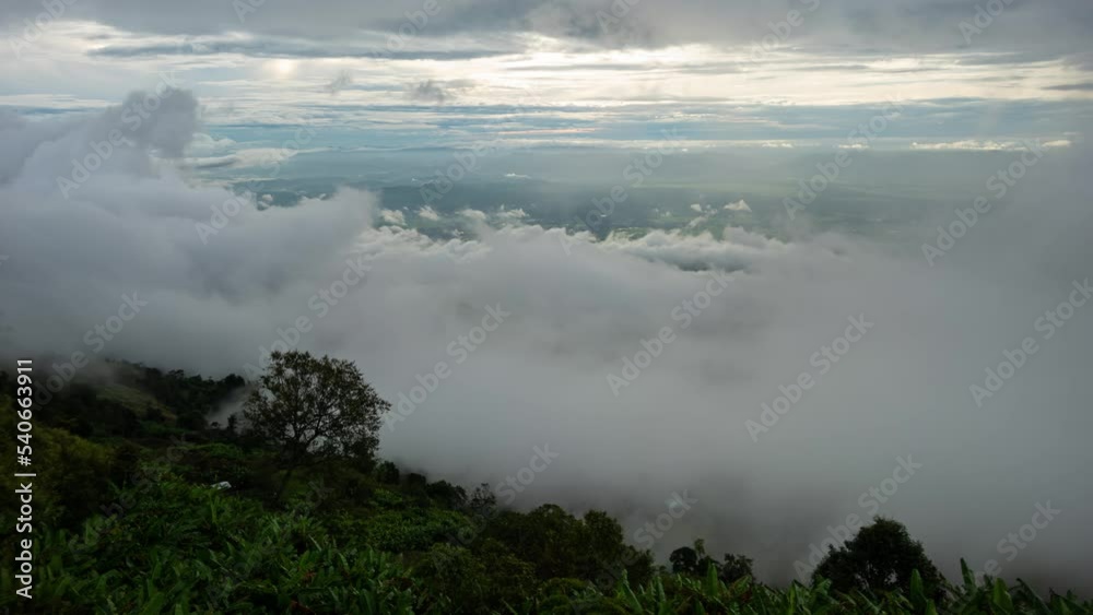 Timelapse foggy or over the clouds while sunrise sky. A sea of fog is formed from stratus. Fog Valley mount ridge nature. Time lapse Beautiful foggy and cloudy slow moving. Timelapse scene B roll 4k. Timelapse foggy or over the clouds while sunrise sky. A sea of fog is formed from stratus. Fog Valley mount ridge nature. Time lapse Beautiful foggy and cloudy slow moving. Timelapse scene B roll 4k.
