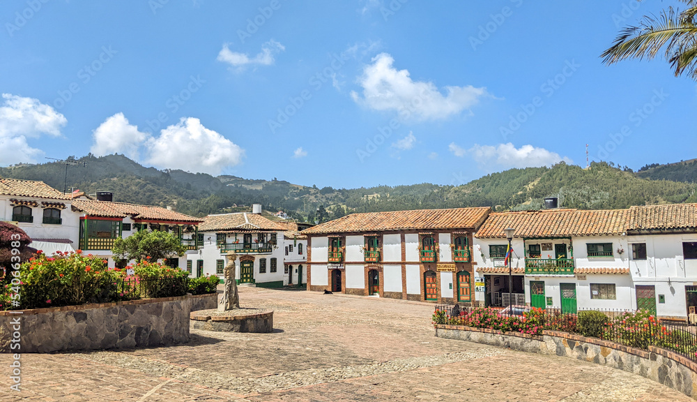 Main square, with colonial spanish houses, in the beautiful historical Colombian village Mongui, Boyaca, Colombia.