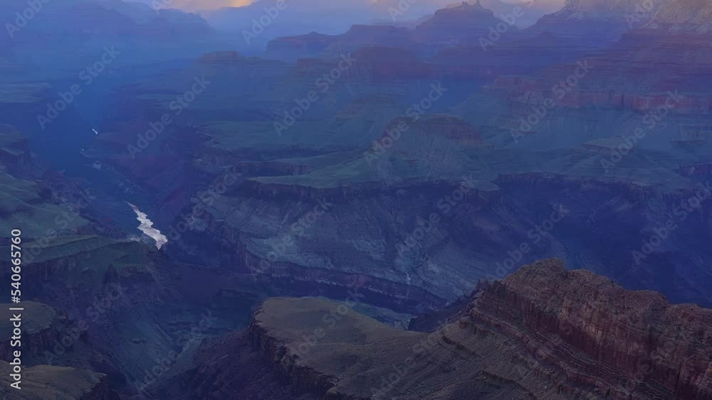 The colorful sun's rays glide over eroded rocks in the Grand Canyon, Arizona. The colorful sun's rays glide over eroded rocks in the Grand Canyon, Arizona.