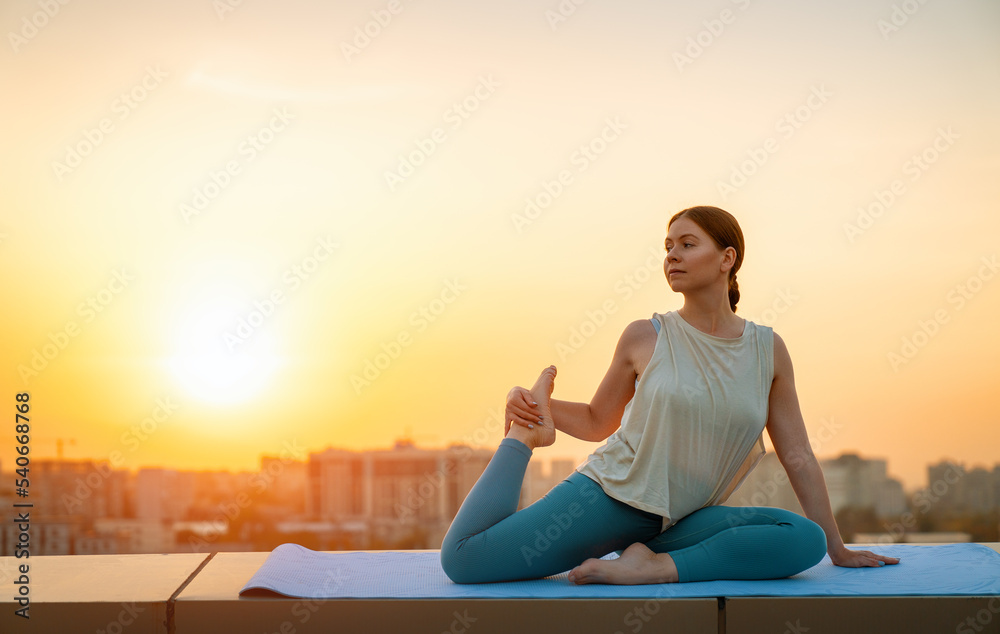Fototapeta premium sportswoman is doing yoga
