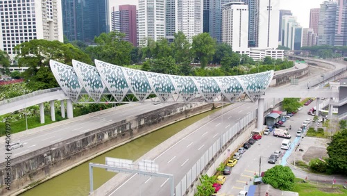 Pintasan Saloma bridge, a famous landmark and tourist attraction in Kuala Lumpur, Malaysia. Counter clockwise rotating shot. photo