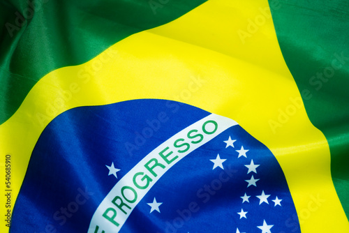Canvas Print Brazilian flag shines above the golden sunset