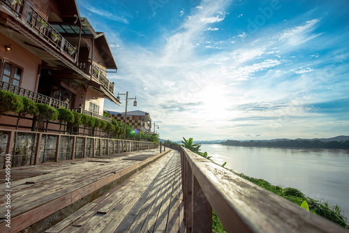 The scenery of the  Mekong River and walkway with lens flair in Chiang Khan.