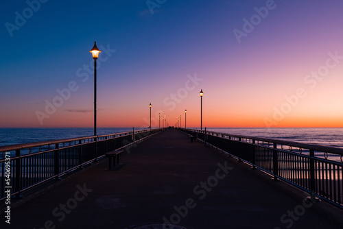 Fototapeta Naklejka Na Ścianę i Meble -  Perspective view of New Brighton Pier at dawn, Christchurch, New Zealand.