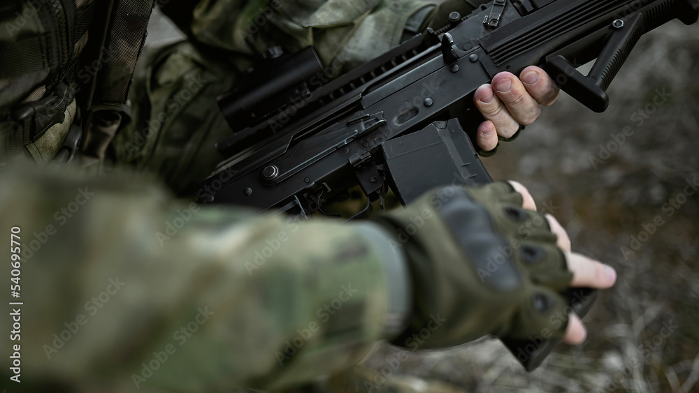 Soldier in camouflage Airsoft Soldier in camouflage Airsoft