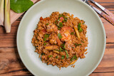 Fried rice with tom yum goong in a plate