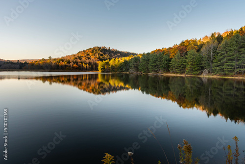 Fototapeta Naklejka Na Ścianę i Meble -  lake surface reflection autumn in the mountains