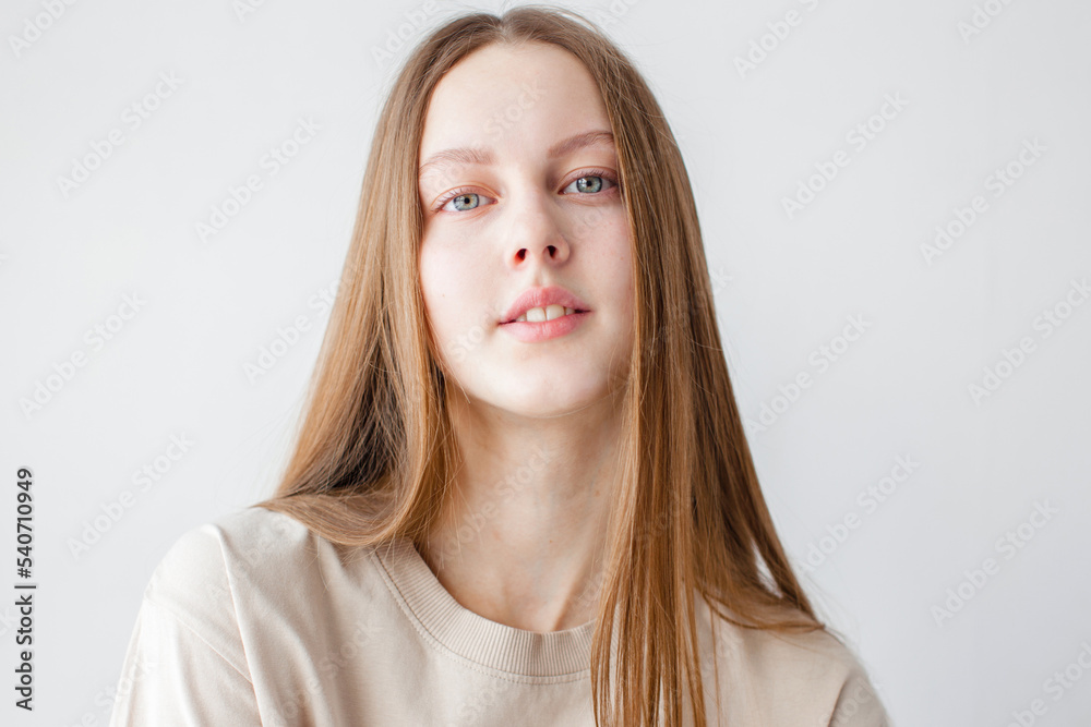 Portrait of young beautiful cute cheerful girl smiling over white background Portrait of young beautiful cute cheerful girl smiling over white background