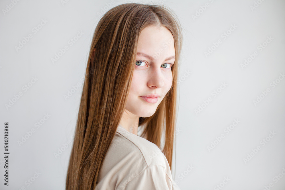 Portrait of young beautiful cute cheerful girl smiling over white background Portrait of young beautiful cute cheerful girl smiling over white background