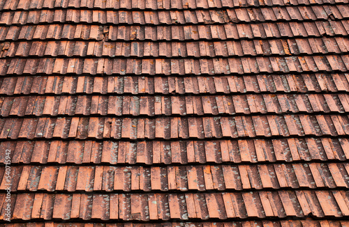 Full frame of old tiled house roof