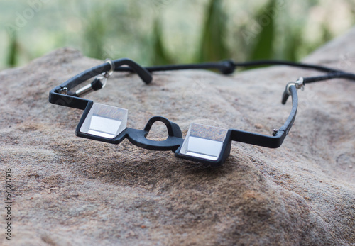 Belay glasses on a rock outdoors