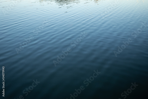 Natural background, water texture on the lake.