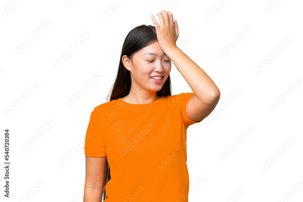 Young Asian woman over isolated background showing ok sign with fingers Young Asian woman over isolated background showing ok sign with fingers