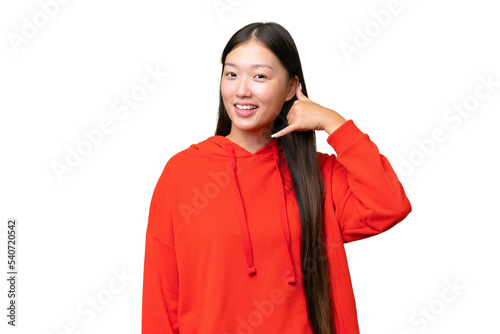 Young Asian woman over isolated background with surprise expression