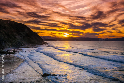 Amazing sunset at Barrika beach, Basque Country. Bay of Biscay, Spain photo