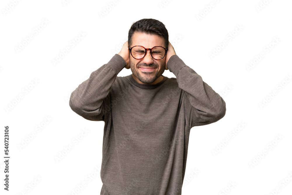 Young handsome caucasian man over isolated background frustrated and covering ears Young handsome caucasian man over isolated background frustrated and covering ears