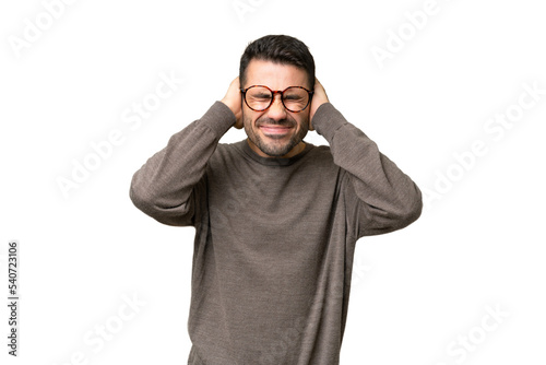 Fotografie Young handsome caucasian man over isolated background frustrated and covering ea