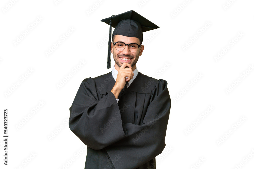 Young university graduate man over isolated background with glasses and smiling Young university graduate man over isolated background with glasses and smiling