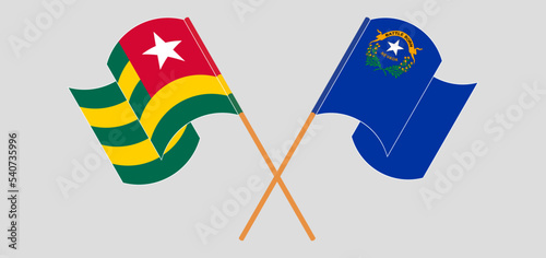 Crossed and waving flags of Togo and The State of Nevada