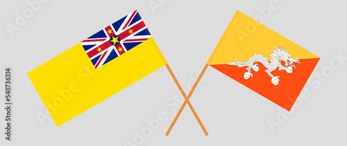 Crossed flags of Niue and Bhutan. Official colors. Correct proportion