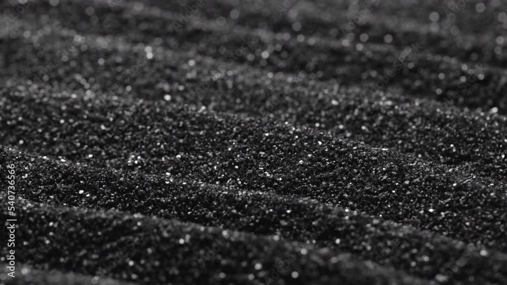 Black sand grunge background. Сlose-up. Black sand grunge background. Сlose-up.