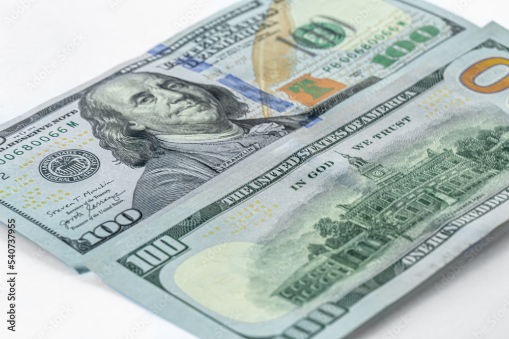 One hundred American dollars close-up, paper money, cash. One hundred American dollars close-up, paper money, cash.