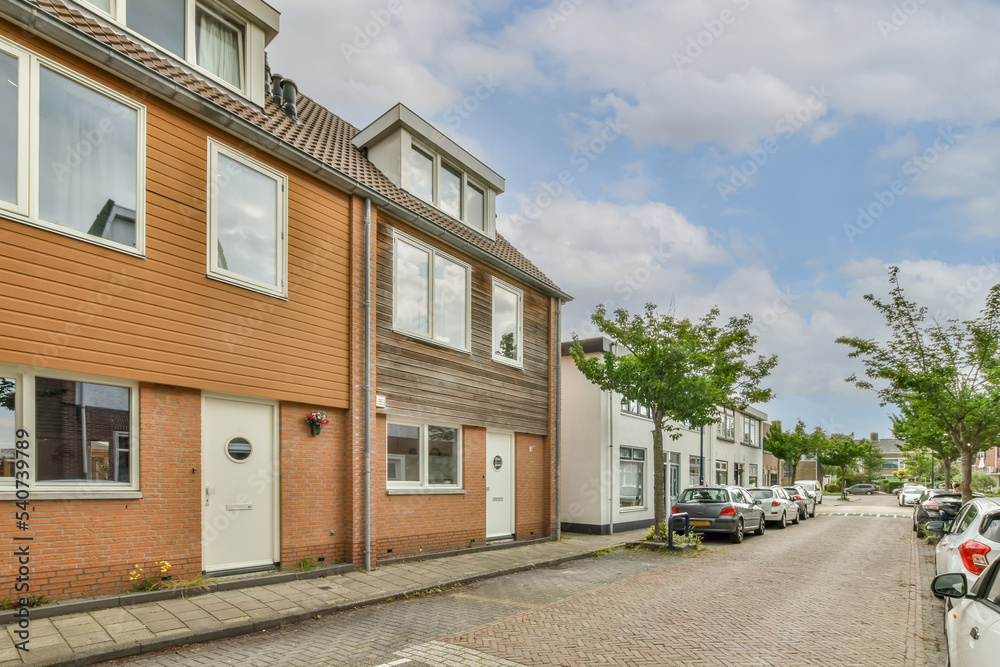 Facade of residential house with parking lot Facade of residential house with parking lot