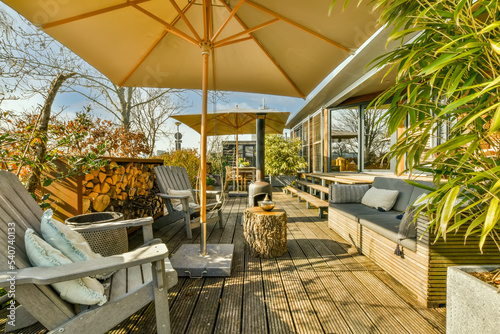 Backyard with furniture and sunshade photo