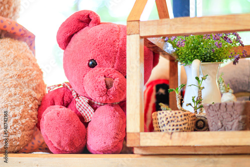 Pink bear doll sit an alone