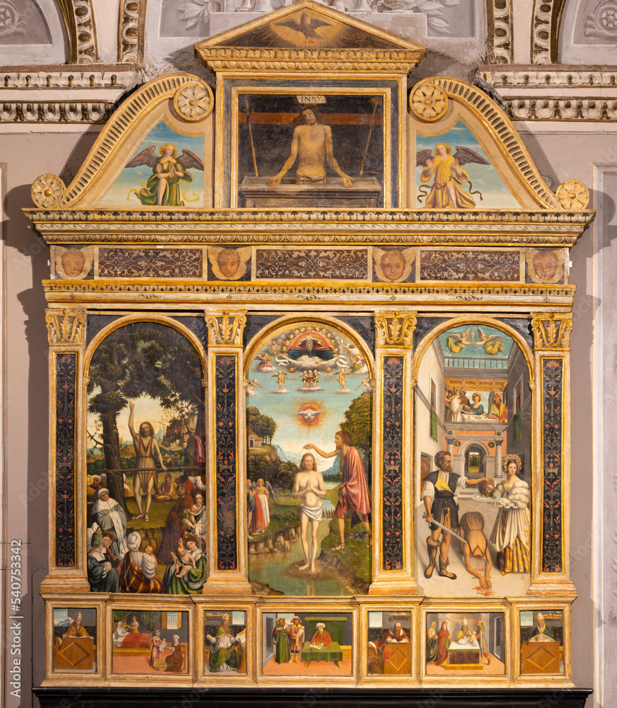 BELLANO, ITALY - JULY 20, 2022: The ranaissance painted altar of John Baptist in the church Chiesa dei santi Nazareo e Celso by unknown artist of 16. cent.