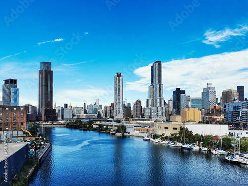 Skyline of Midtown Manhattan with East River and skyscrapers, seen from Pulaski Bridge, between Greenpoint in Brooklyn and Long Island City in Queens, New York City, USA photo