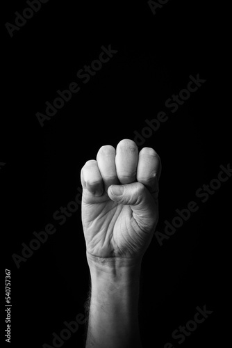 Hand demonstrating the Japanese sign language letter 'SA' or 'さ' with copy space