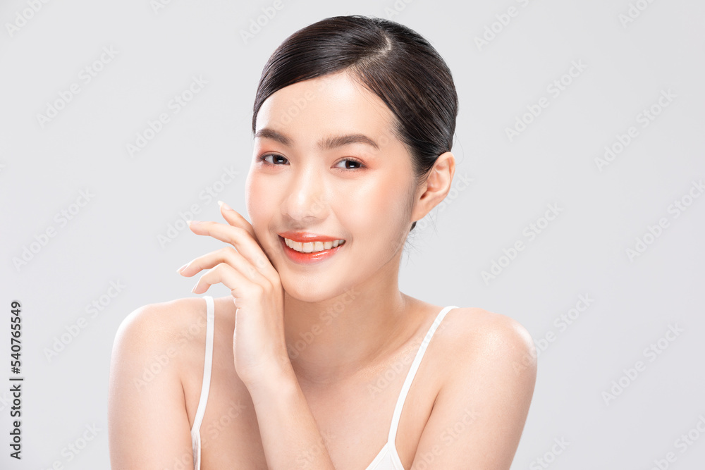 Beautiful Asian young woman touching soft cheek smile with clean and fresh skin Happiness and cheerful with positive emotional isolated on white background. Self care of Beauty and Cosmetics Concept Beautiful Asian young woman touching soft cheek smile with clean and fresh skin Happiness and cheerful with positive emotional isolated on white background. Self care of Beauty and Cosmetics Concept