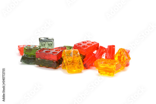 multi-colored marmalade (jelly, gelatin) of red, yellow, green colors in the form of blocks on a white background