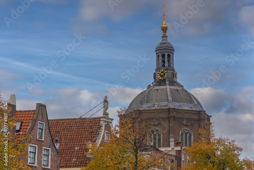 Leiden, Netherlands 3 October 2022. The Oude Vest canal, traditional houses and Marekerk Protestant church photo