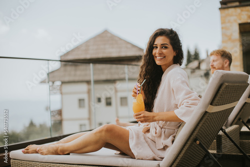 Young couple relaxing on be...