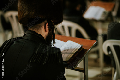 Orthodox Jew at the western wall praying photo