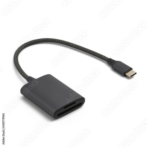 Metal card reader with type-с cord on white background, shallow depth of field