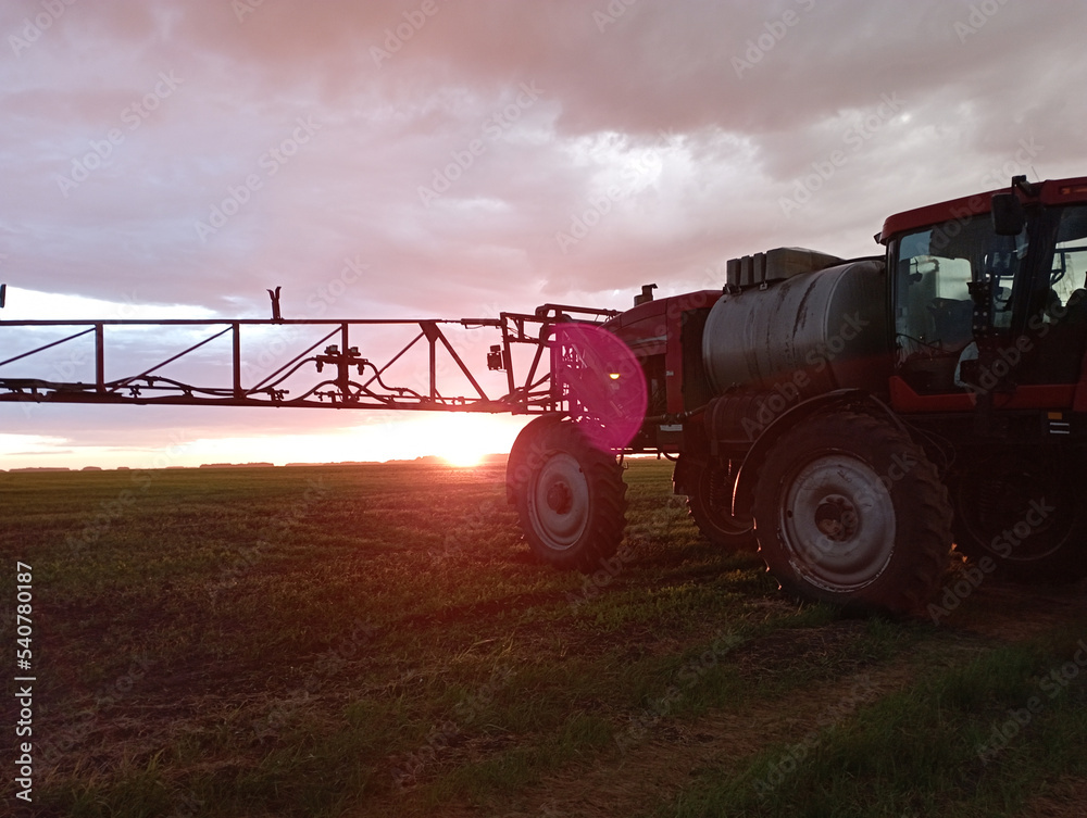 Fototapeta premium Special tractor for the treatment of crops from weeds and pests.