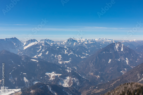 Scenic view on snow capped mountain peaks of Karawanks in Carinthia (Kaernten), Austria. Julian Alps. Winter wonderland in Austrian Alps, Europe. View from Freiberg on Hochstuhl (Stol), Triglav, Kepa © Chris