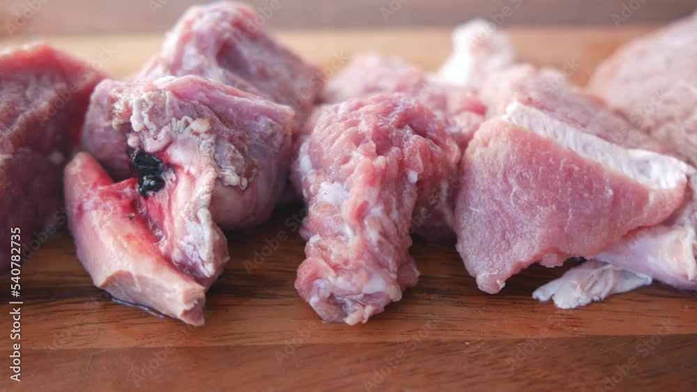 close up of raw meat on chopping board on a chopping board close up of raw meat on chopping board on a chopping board