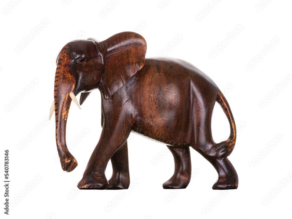 Elephant decorative made of wood, handmade, carved with detailed elaboration. Animal figurine, interior decoration, souvenir. Isolated on white background