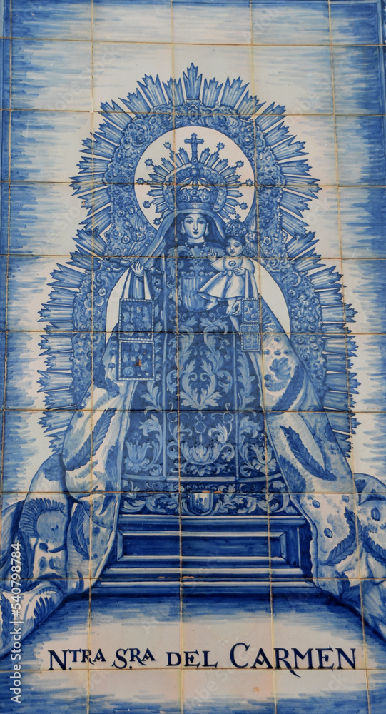 Isla Crisitna, Spain - 27 September 2022: Mural on the wall of the Virgin of Carmen