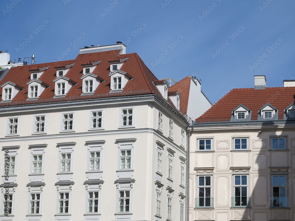 Vienna Historic White Buildings with Red Roofs and Blue Sky, Austria